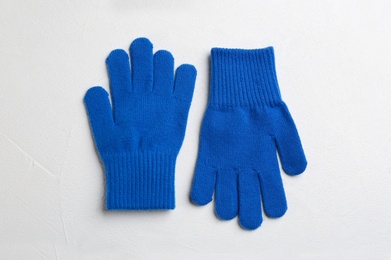 Photo of Stylish gloves on white background, flat lay