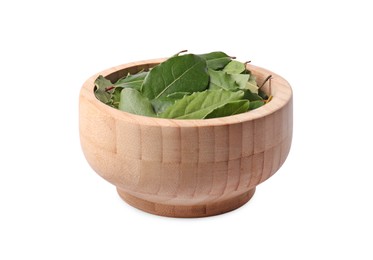 Wooden bowl with bay leaves on white background