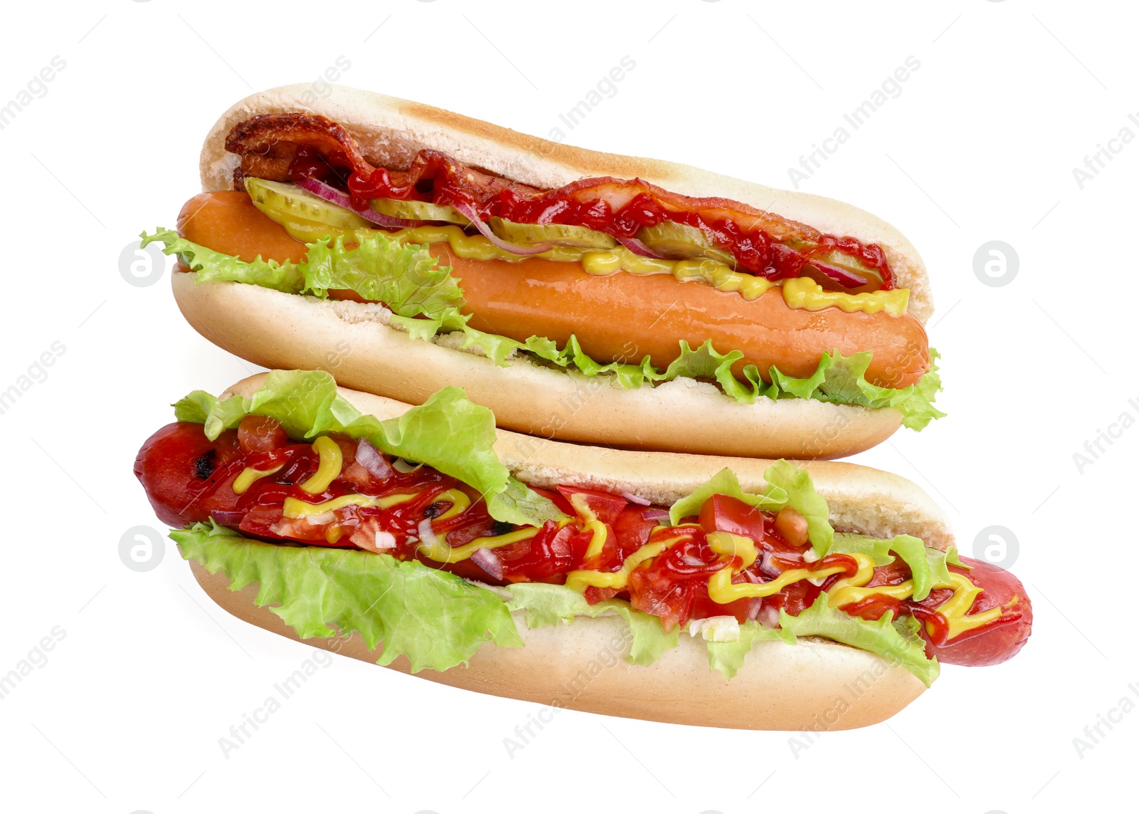 Photo of Tasty hot dogs with different toppings isolated on white, top view