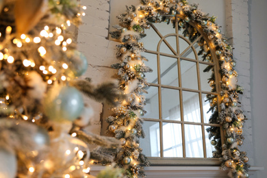 Festive room interior with beautiful Christmas tree, focus on window