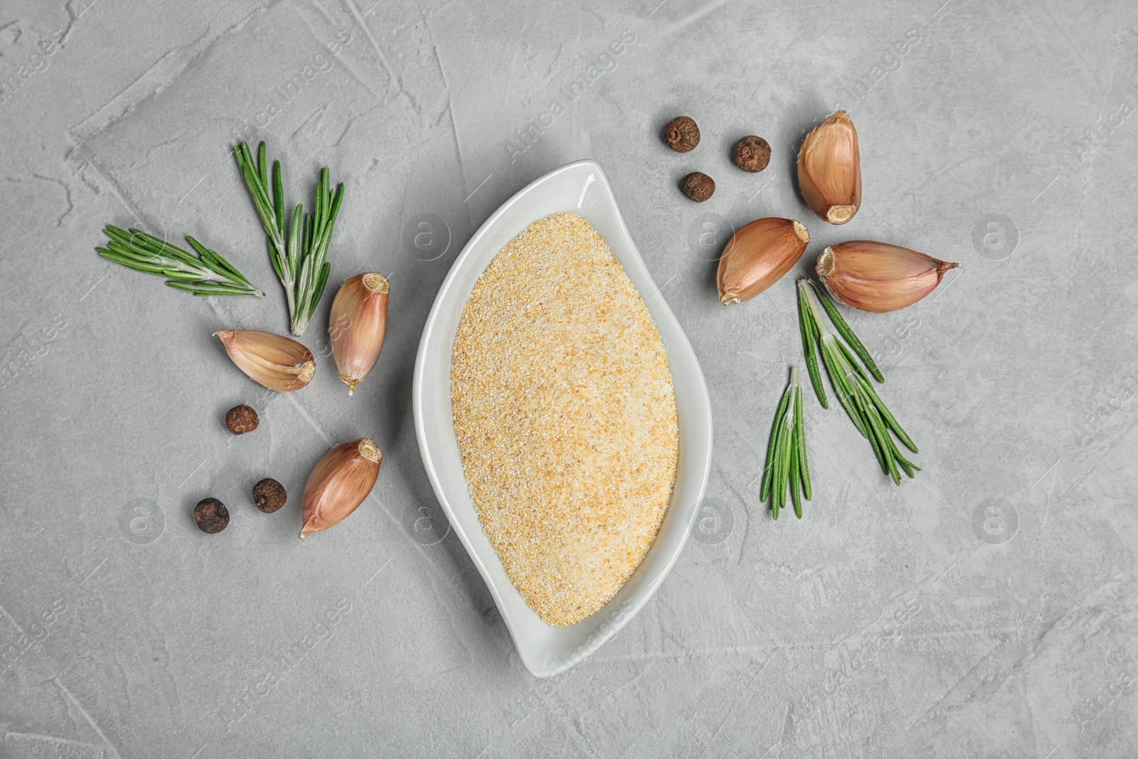 Photo of Flat lay composition with garlic products on grey background