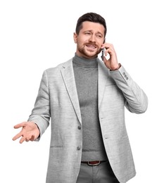 Handsome bearded businessman talking on smartphone against white background