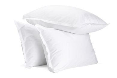 Photo of Many new soft pillows isolated on white