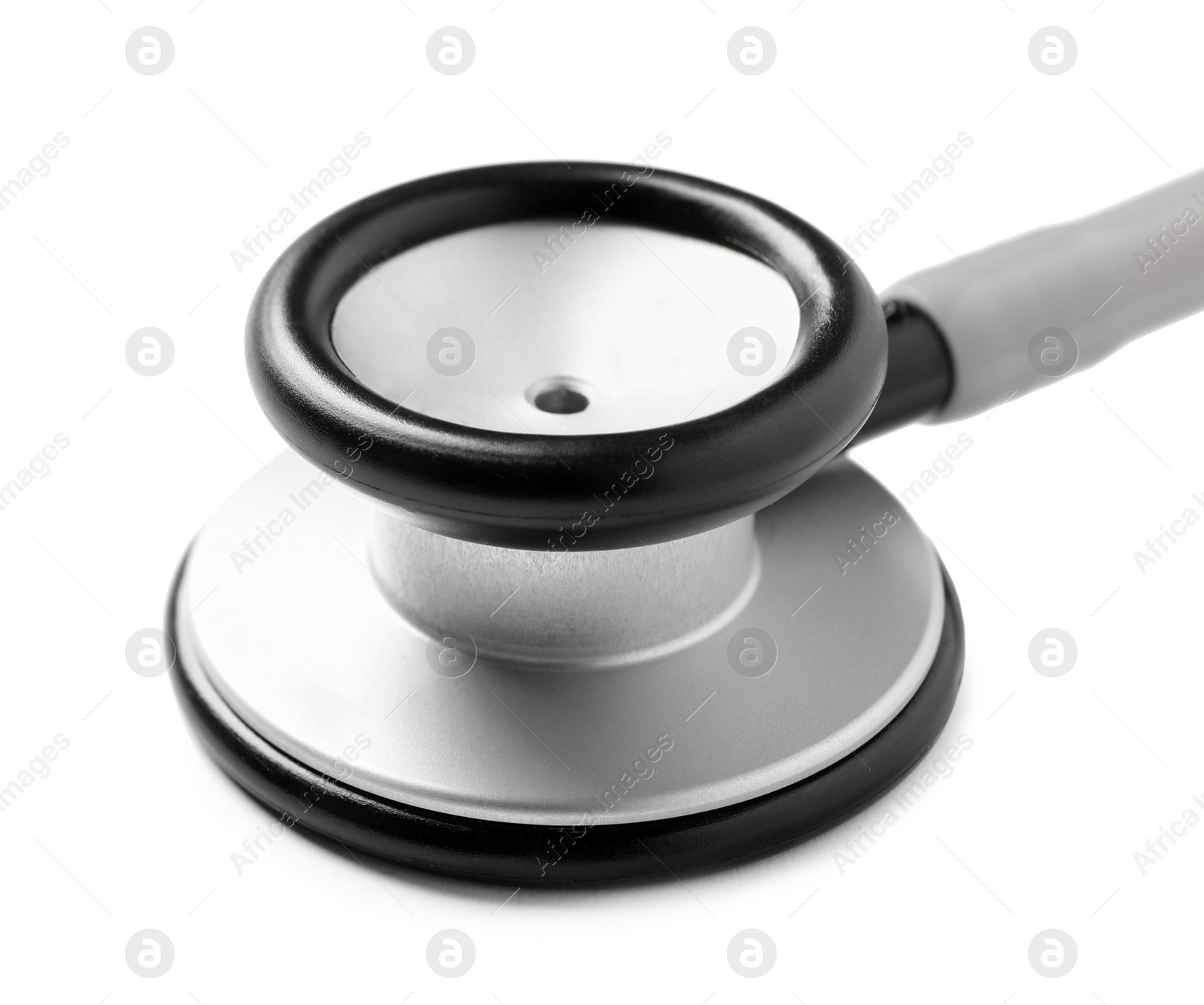 Photo of Modern stethoscope on white background, closeup view