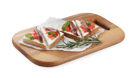 Photo of Delicious sandwiches with cream cheese, anchovies, tomatoes and basil on white background