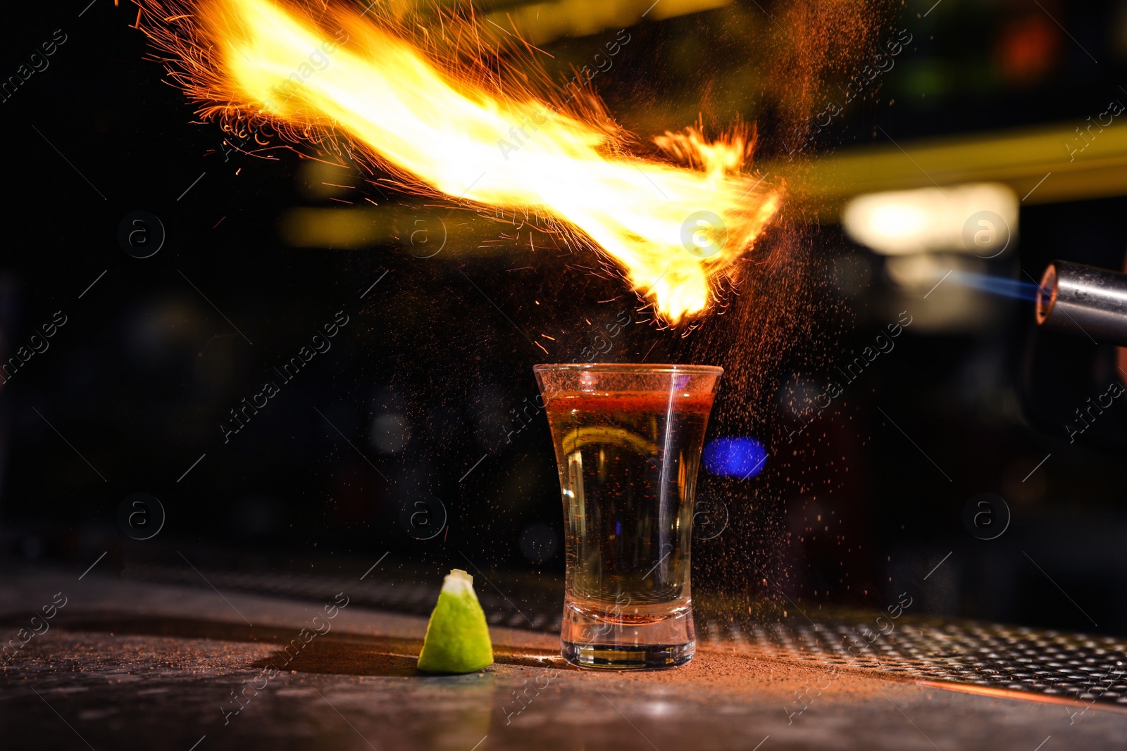 Photo of Flaming Mexican Tequila shot on bar counter