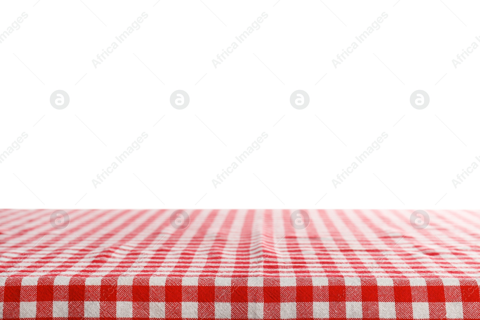 Photo of Empty table covered with napkin against white background