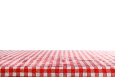 Photo of Empty table covered with napkin against white background