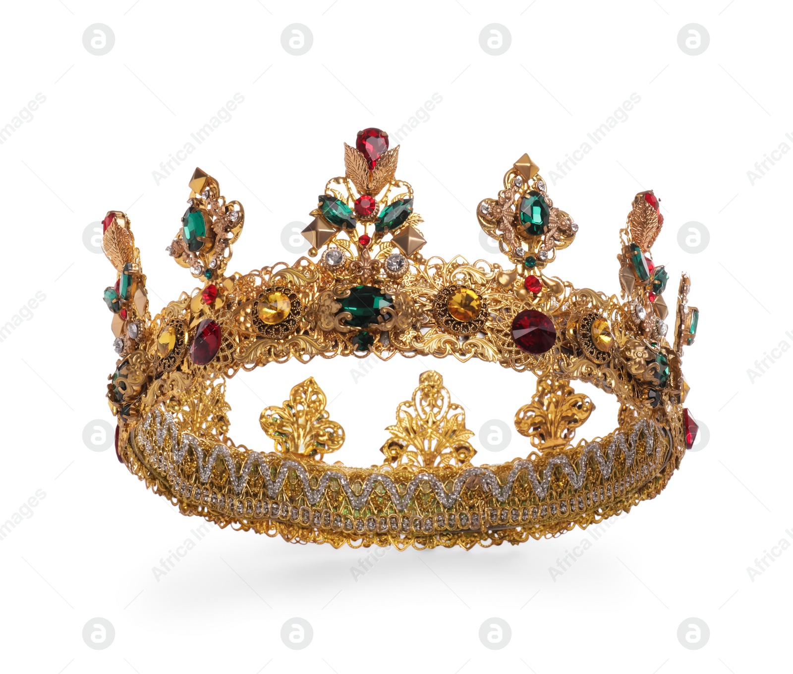 Photo of Beautiful gold crown with gems isolated on white