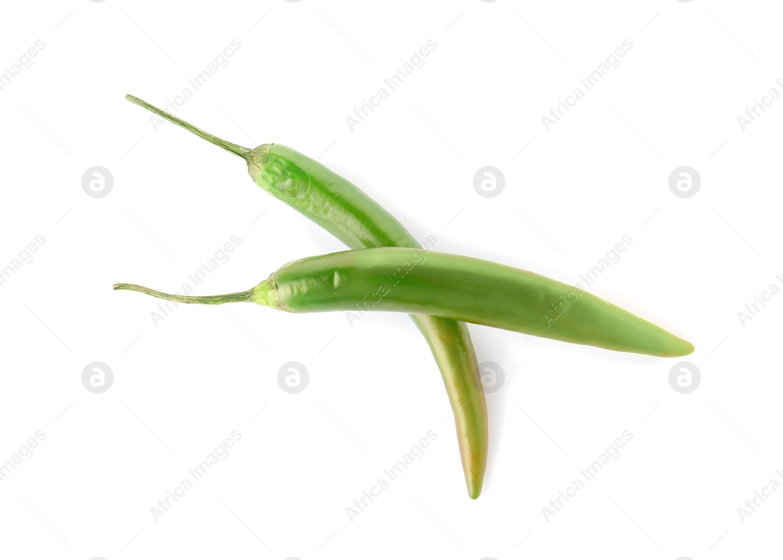 Photo of Ripe hot chili peppers on white background