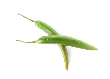 Ripe hot chili peppers on white background