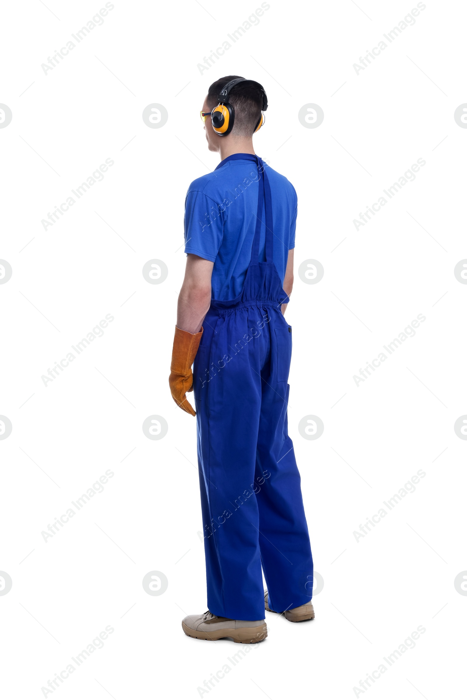 Photo of Young man wearing safety equipment on white background, back view