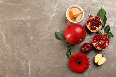 Photo of Flat lay composition with Rosh Hashanah holiday attributes on marble table. Space for text