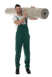 Photo of Male worker with rolled carpet on white background