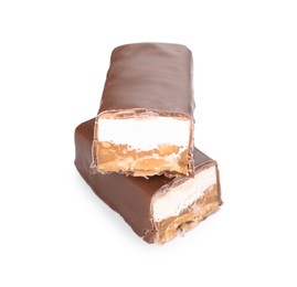 Photo of Pieces of tasty chocolate bars with nougat and nuts on white background