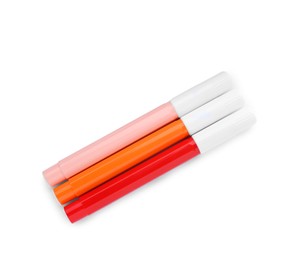 Photo of Different colorful markers on white background, top view