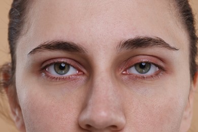 Photo of Closeup view of woman with beautiful hazel eyes