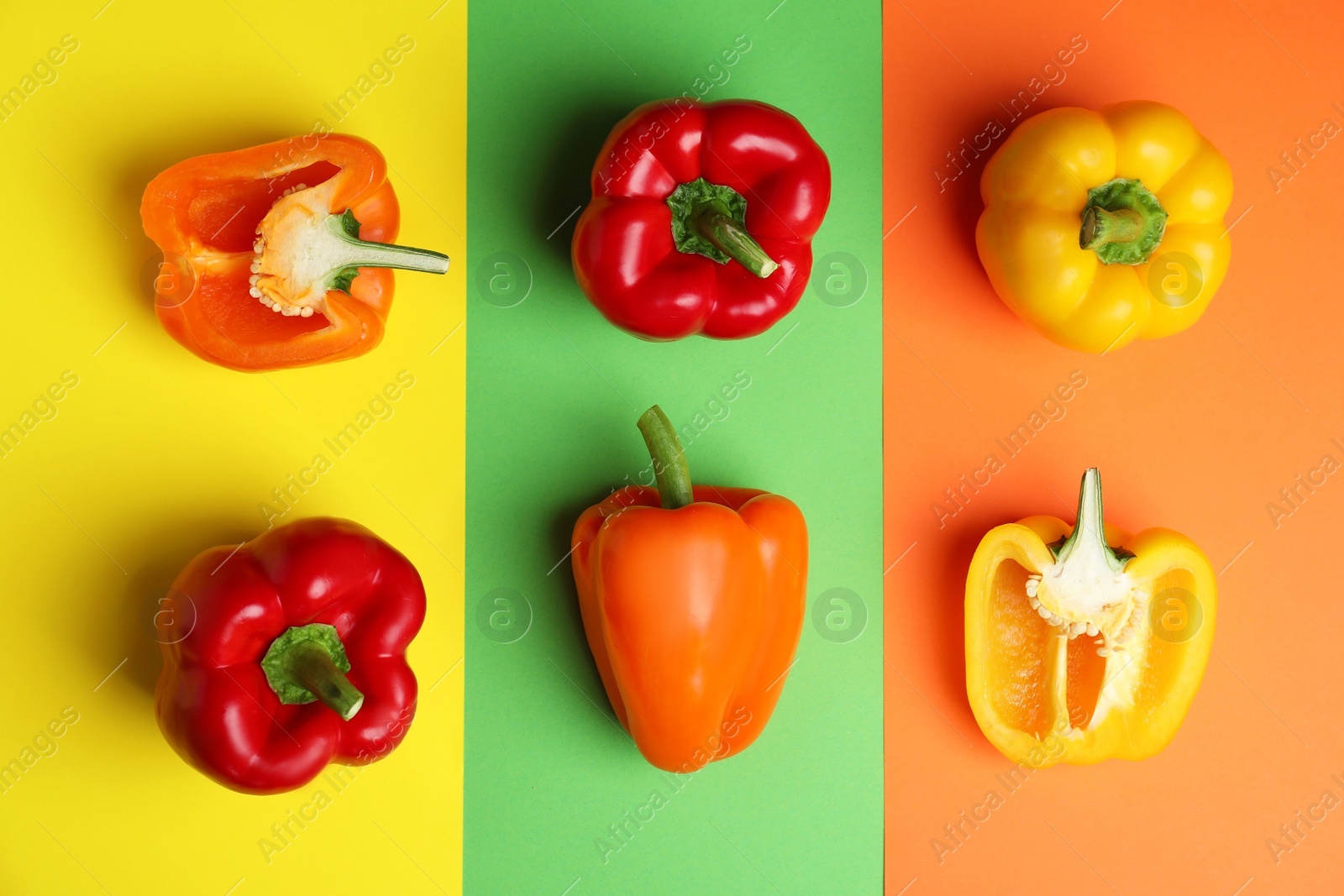 Photo of Flat lay composition with ripe bell peppers on color background