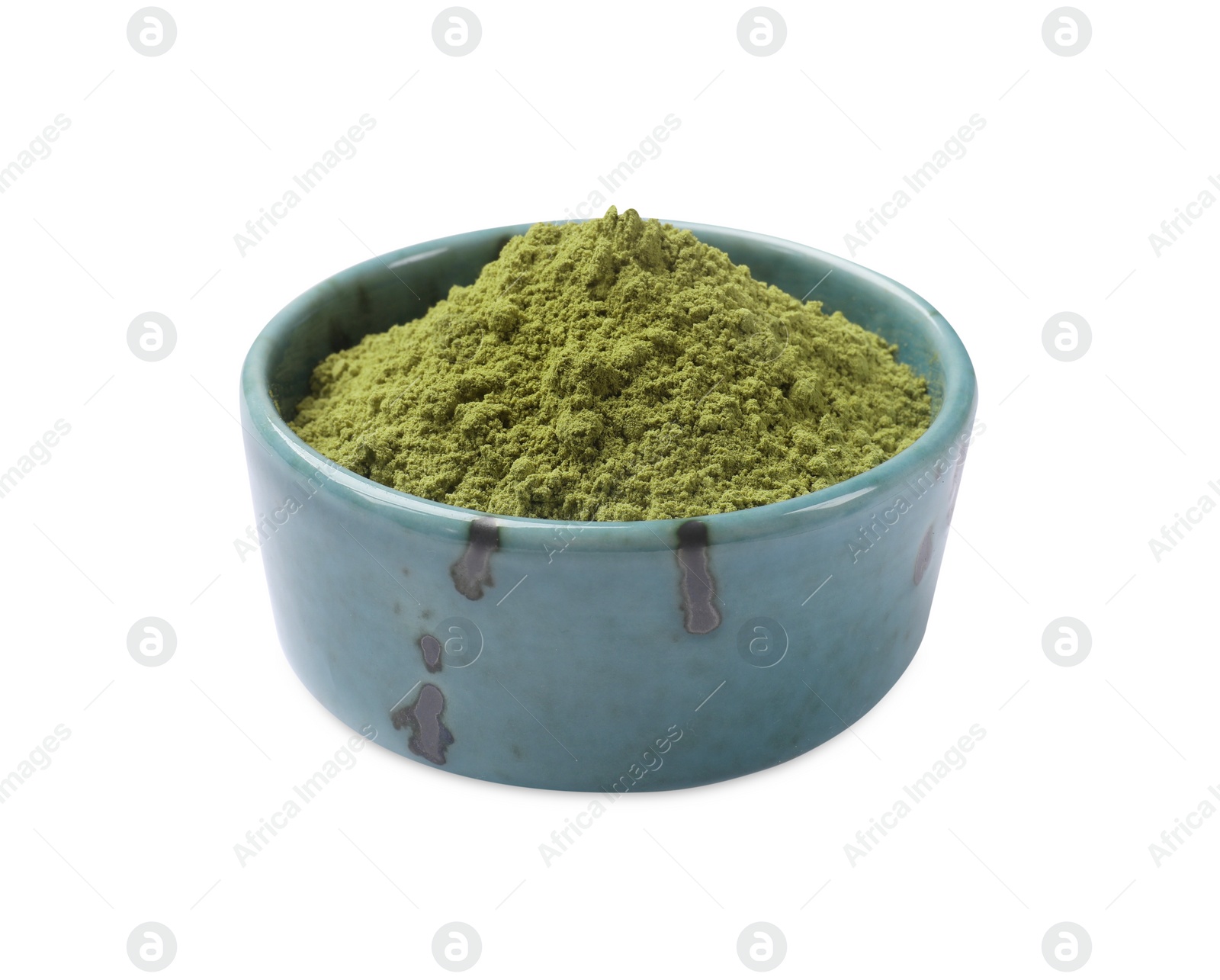 Photo of Henna powder in bowl isolated on white