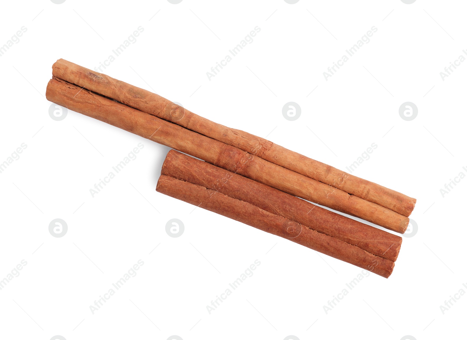 Photo of Dry aromatic cinnamon sticks isolated on white, top view