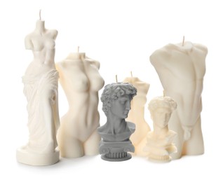 Image of Collection of beautiful sculptural candles on white background 