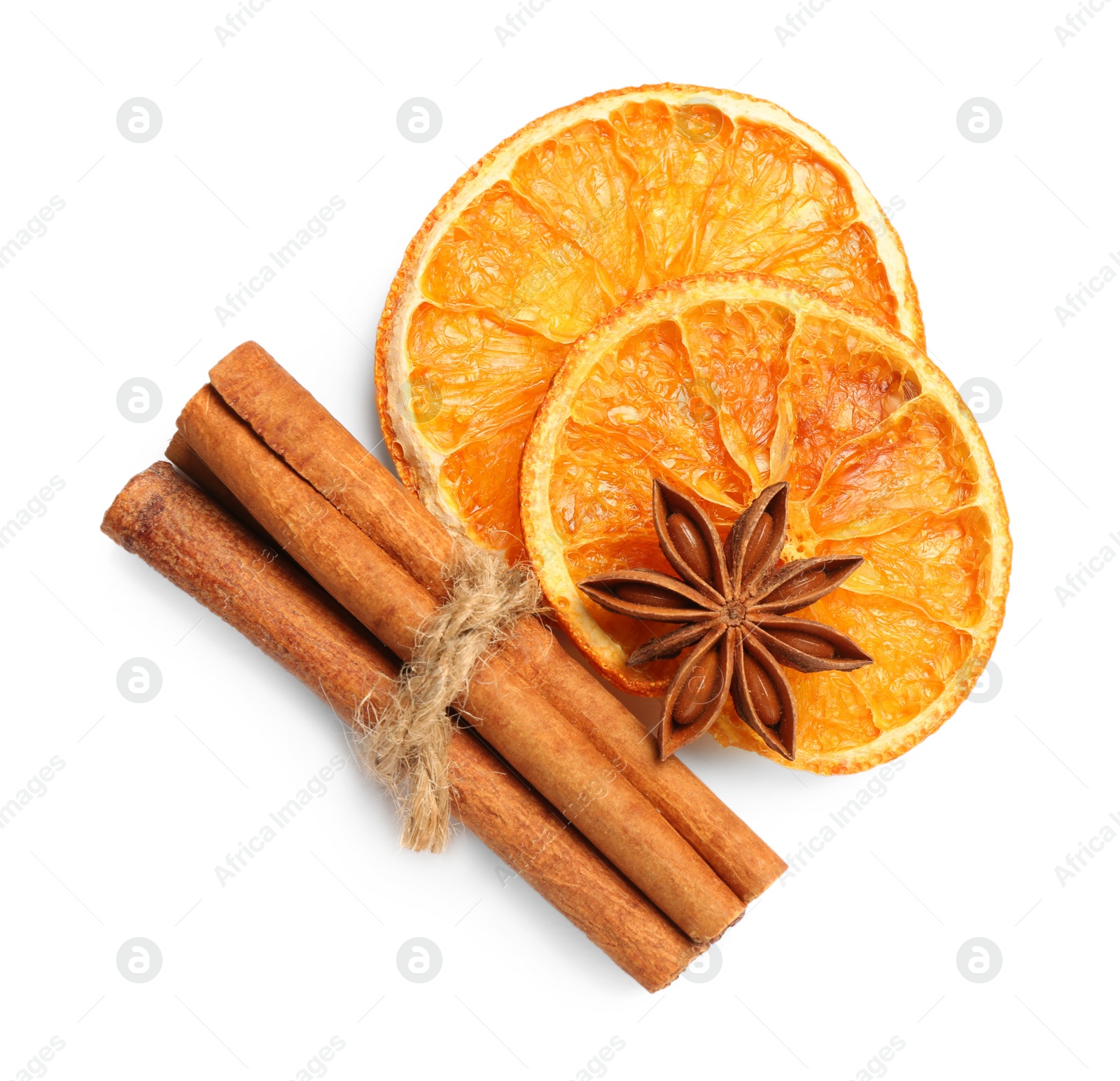 Photo of Dry orange slices, cinnamon sticks and anise star isolated on white, top view