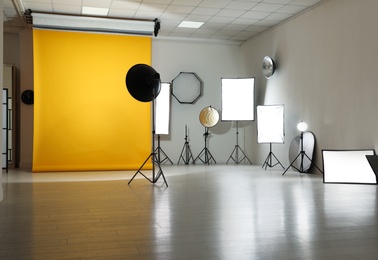 Photo of Interior of modern photo studio with professional equipment