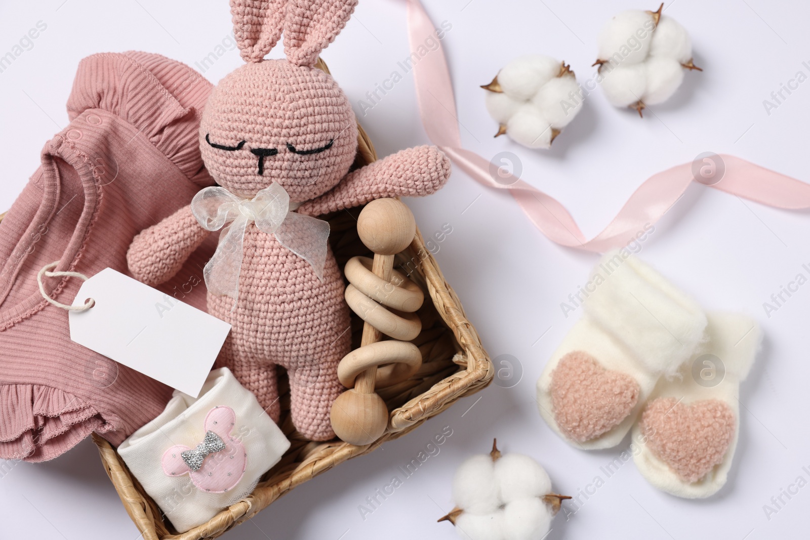 Photo of Flat lay composition with different baby accessories on white background