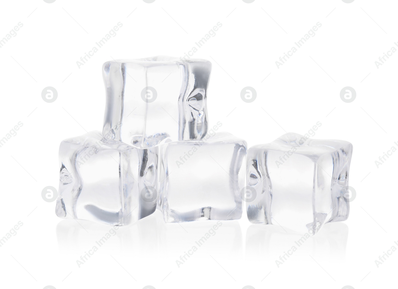 Photo of Many crystal clear ice cubes isolated on white