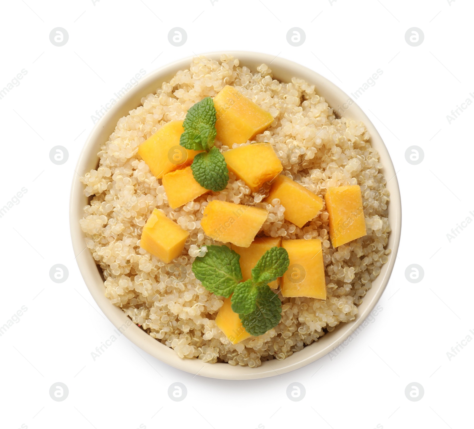 Photo of Tasty quinoa porridge with pumpkin and mint in bowl isolated on white, top view