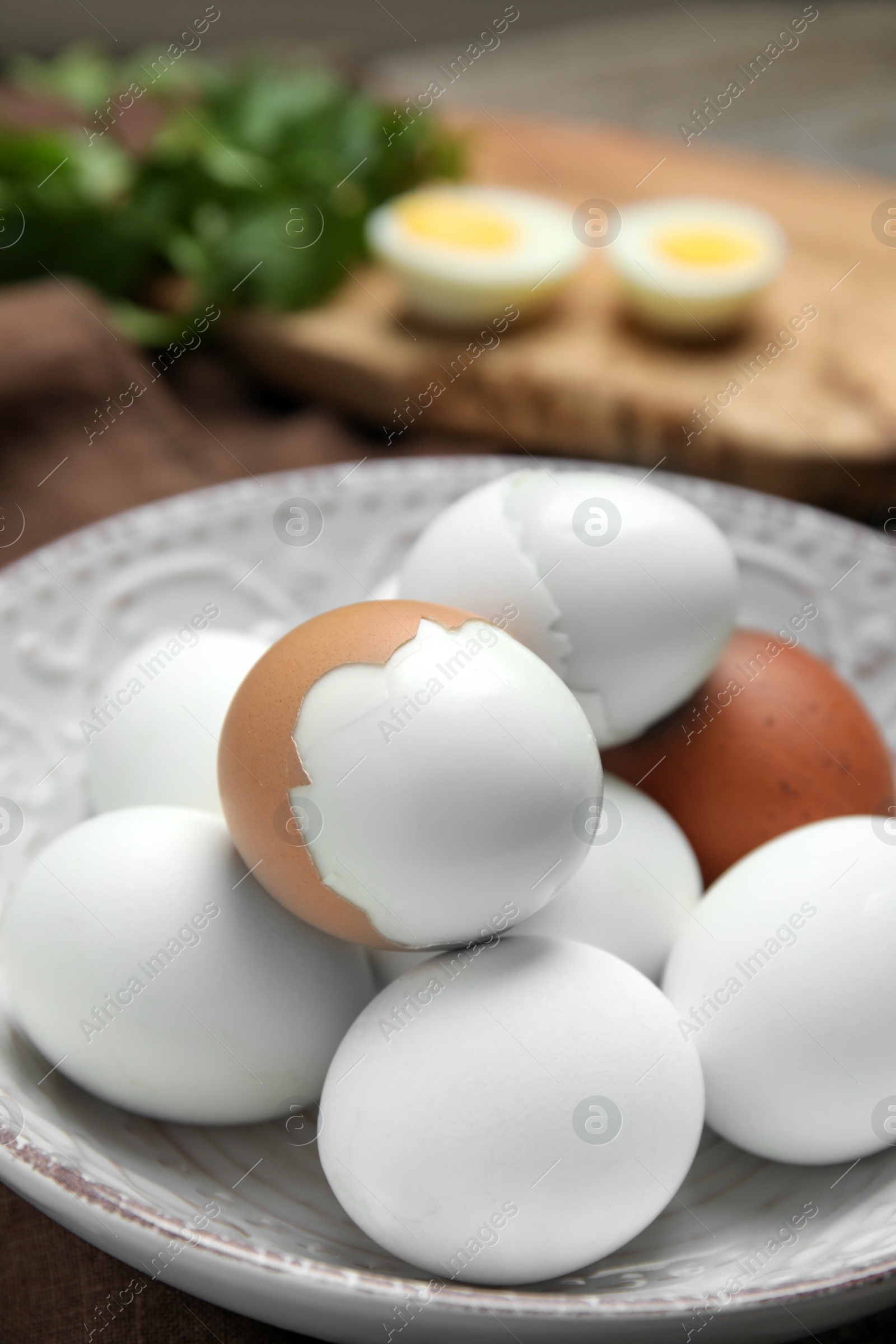 Photo of Many boiled eggs on plate, closeup view