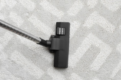 Photo of Vacuum cleaner on carpet