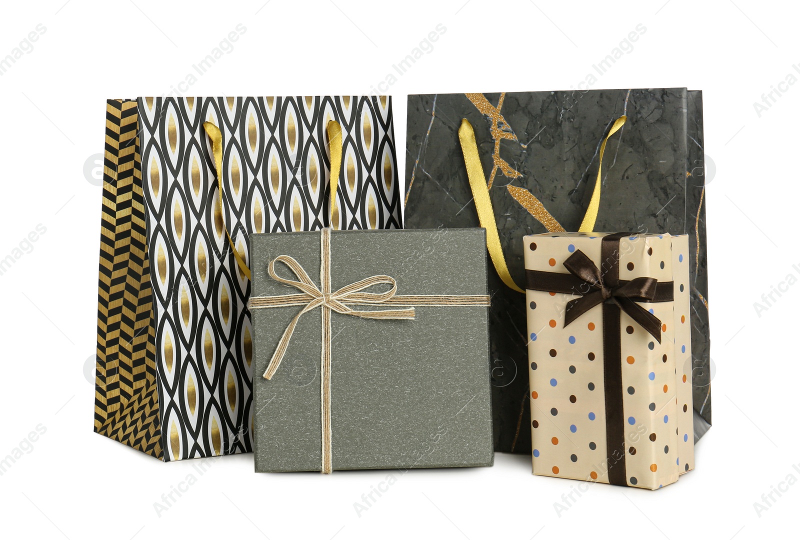 Photo of Paper bags and gift boxes isolated on white