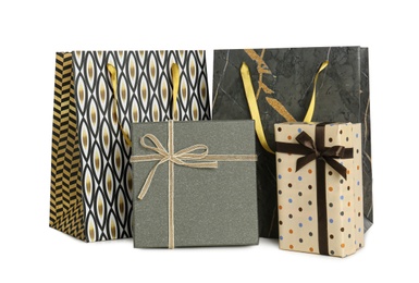 Paper bags and gift boxes isolated on white