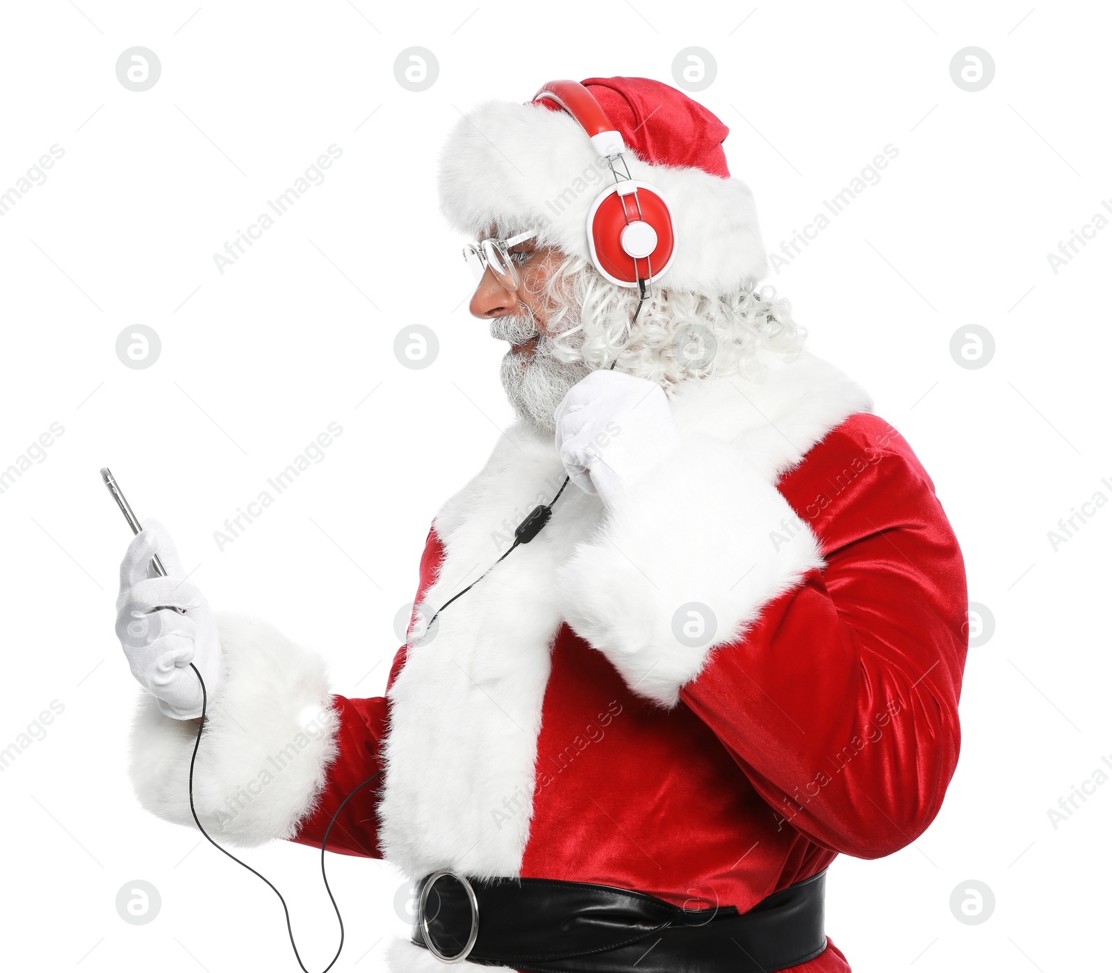 Photo of Santa Claus listening to Christmas music on white background