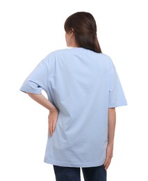 Woman in stylish light blue t-shirt on white background, back view