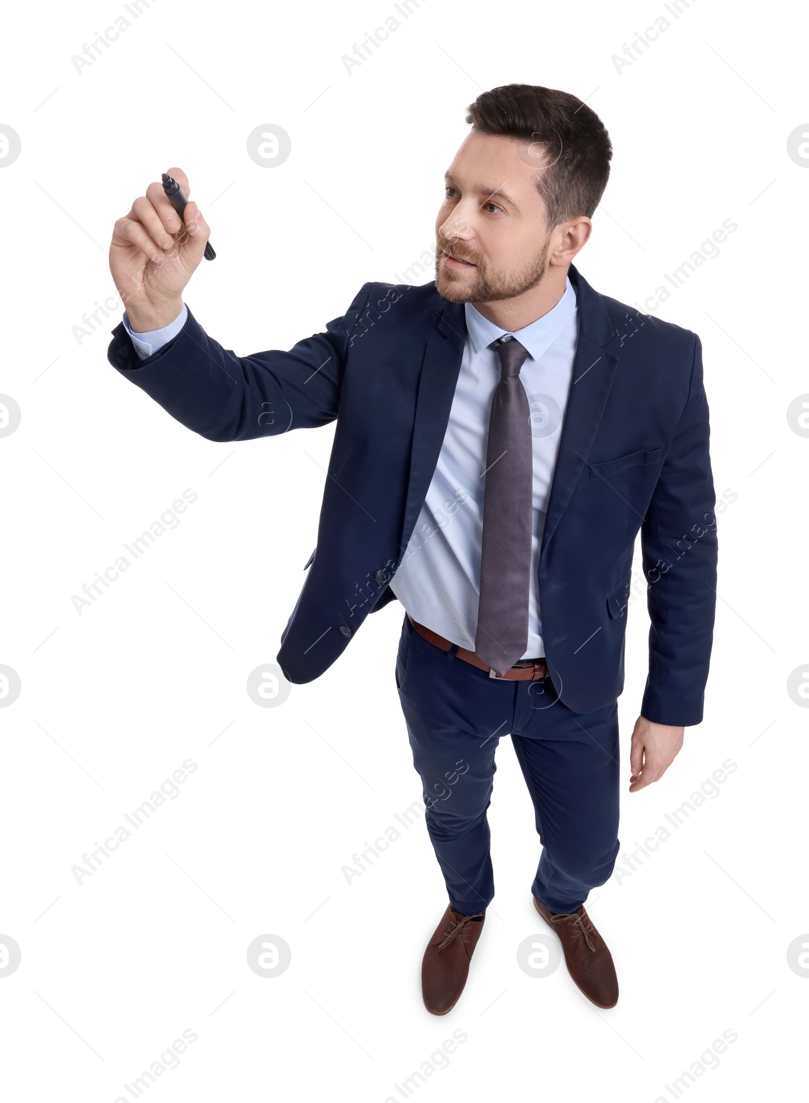 Photo of Handsome bearded businessman in suit with marker on white background, above view