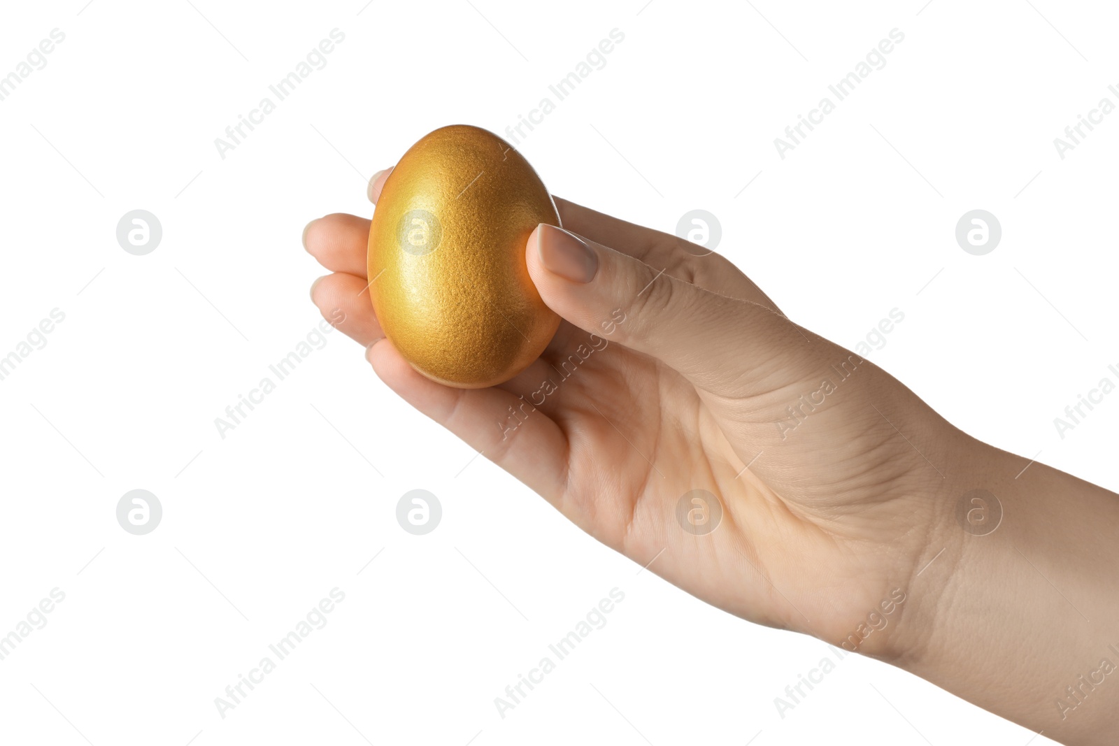Photo of Woman holding golden egg on white background, closeup