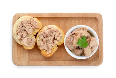 Photo of Tasty sandwiches with cod liver and parsley isolated on white, top view