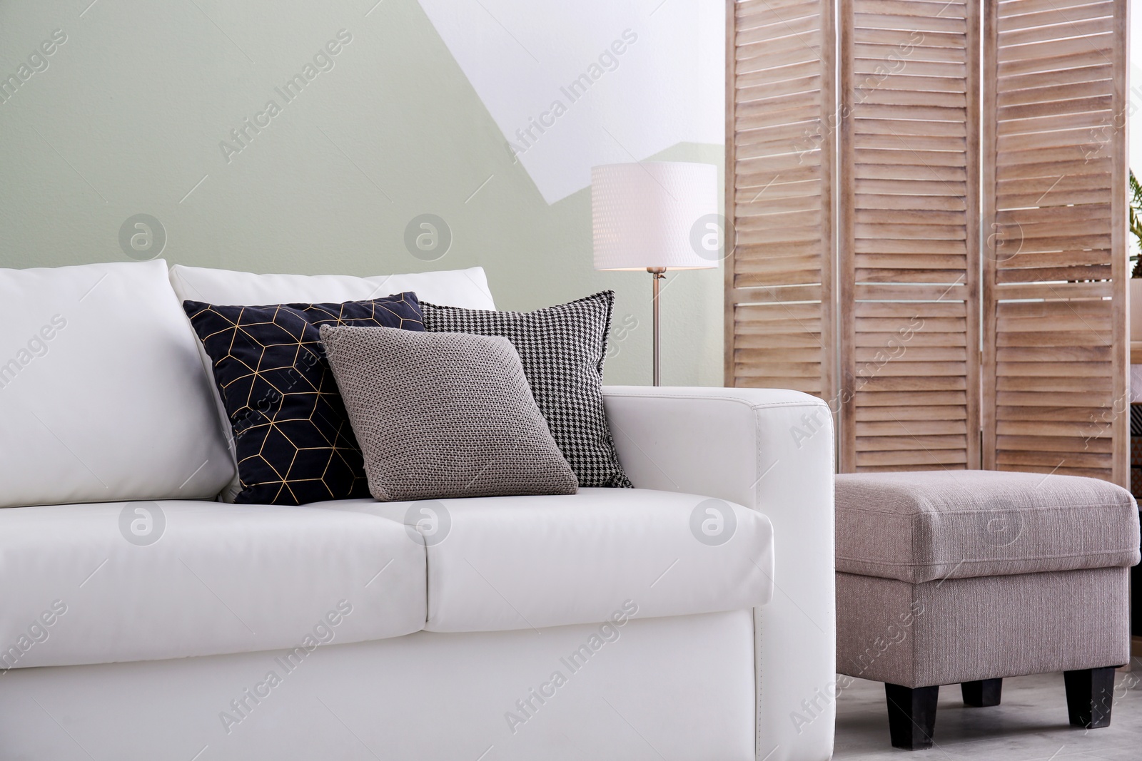 Photo of Living room interior with comfortable sofa