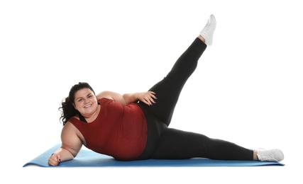 Overweight woman doing exercise on white background