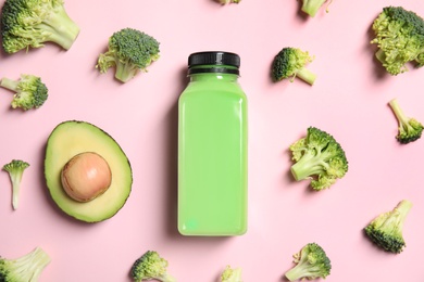 Photo of Flat lay composition with smoothie in bottle and ingredients on color background