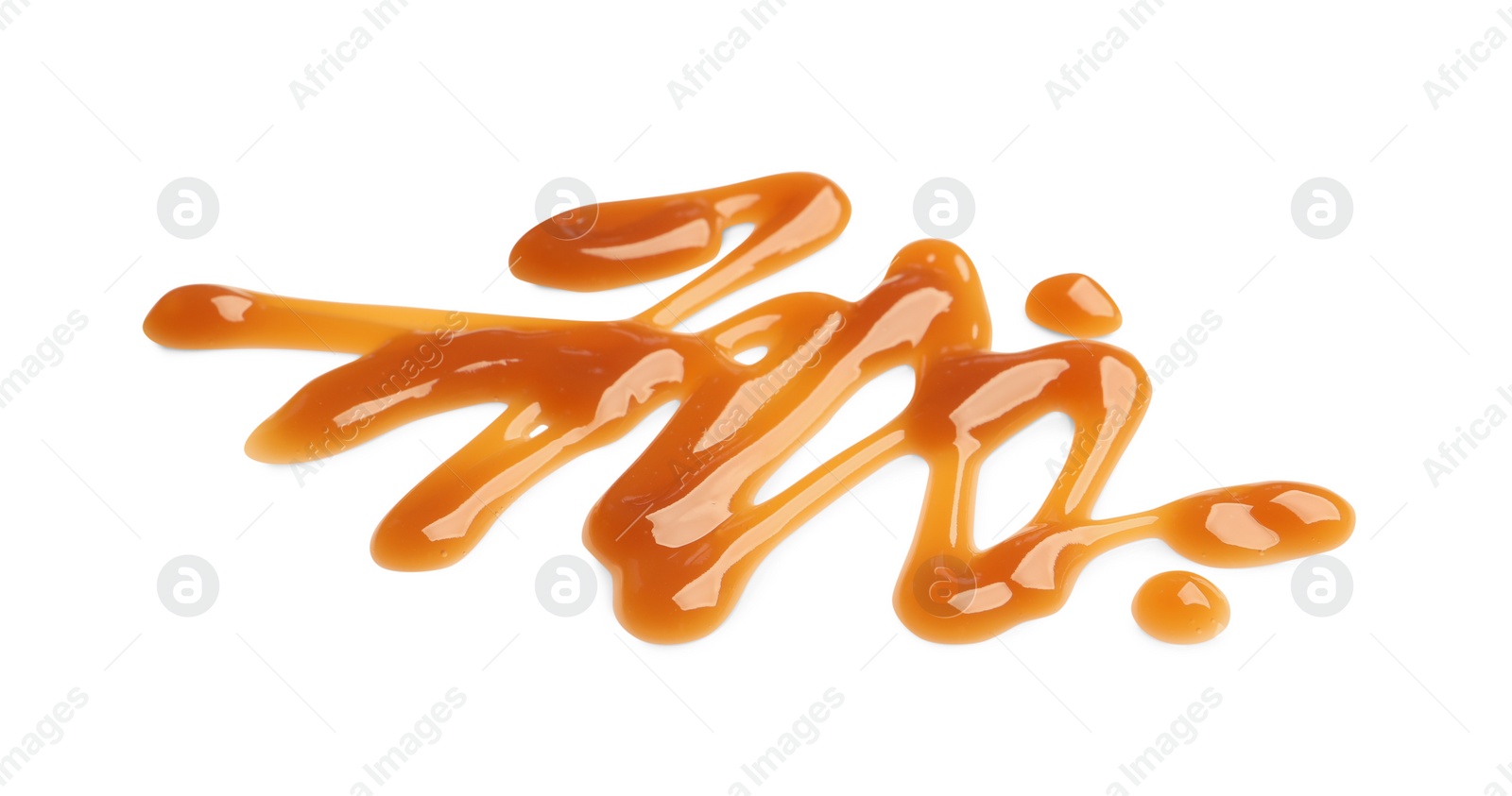 Photo of Stroke of sweet caramel sauce isolated on white