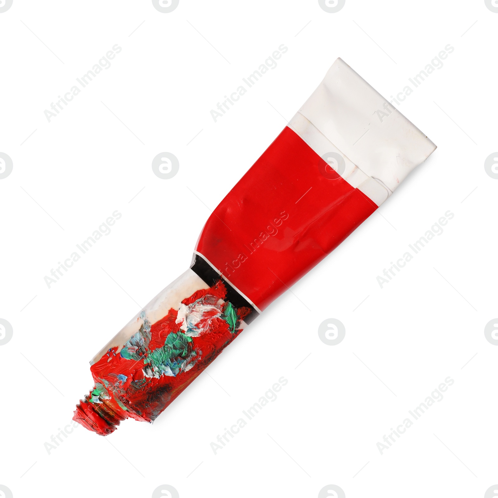 Photo of Tube with oil paint on white background, top view