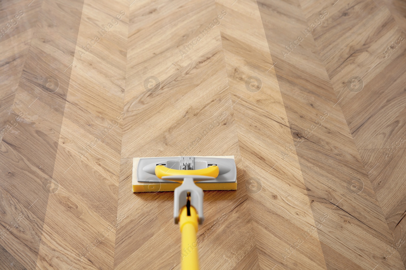 Image of Washing of floor with mop. Difference before and after cleaning