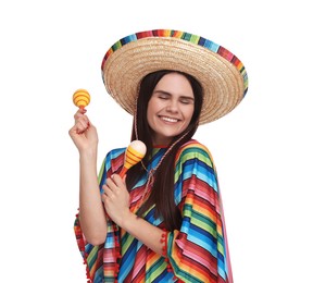 Young woman in Mexican sombrero hat and poncho with maracas on white background