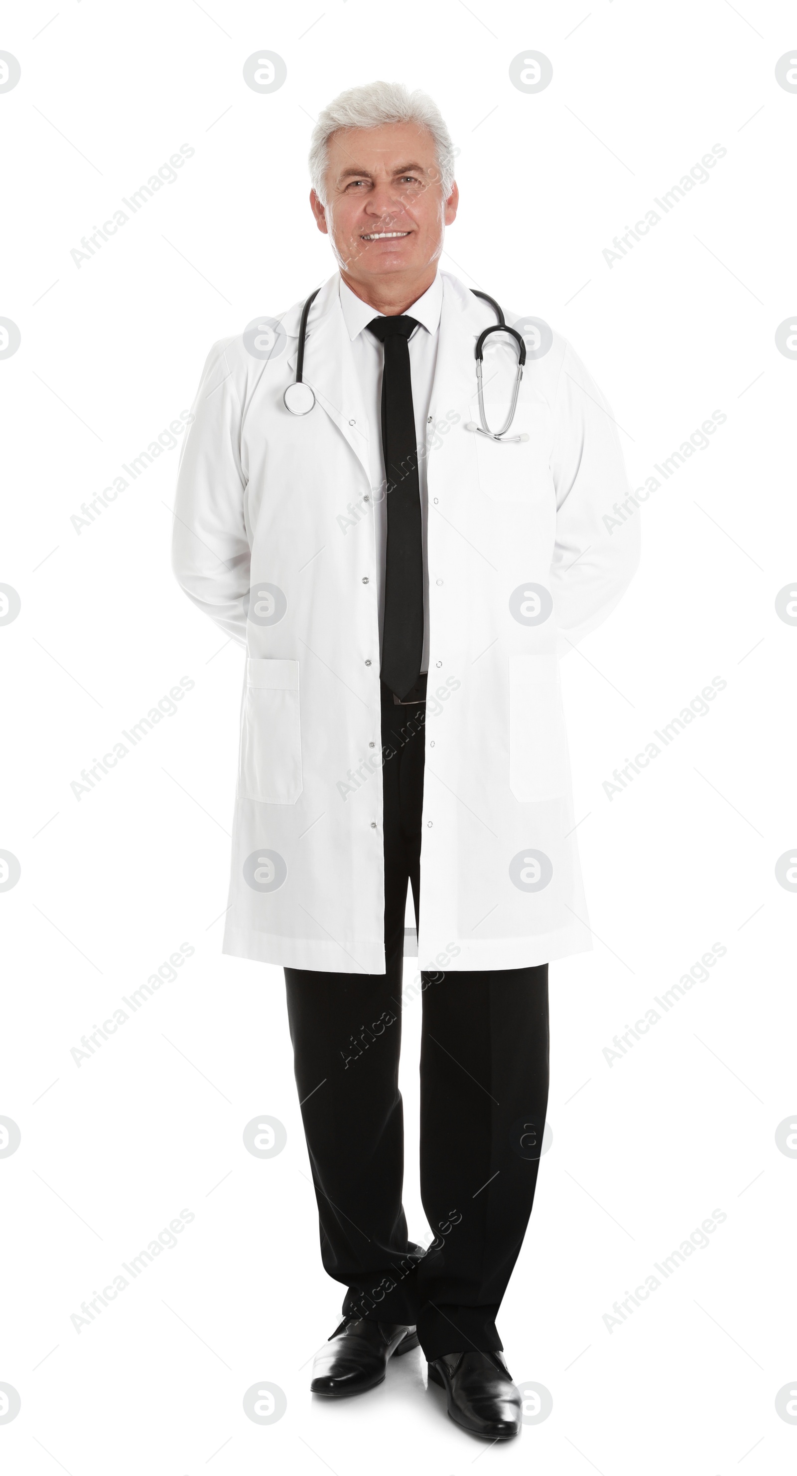 Photo of Full length portrait of male doctor with stethoscope isolated on white. Medical staff