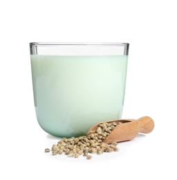 Photo of Scoop with hemp seeds and glass of milk on white background