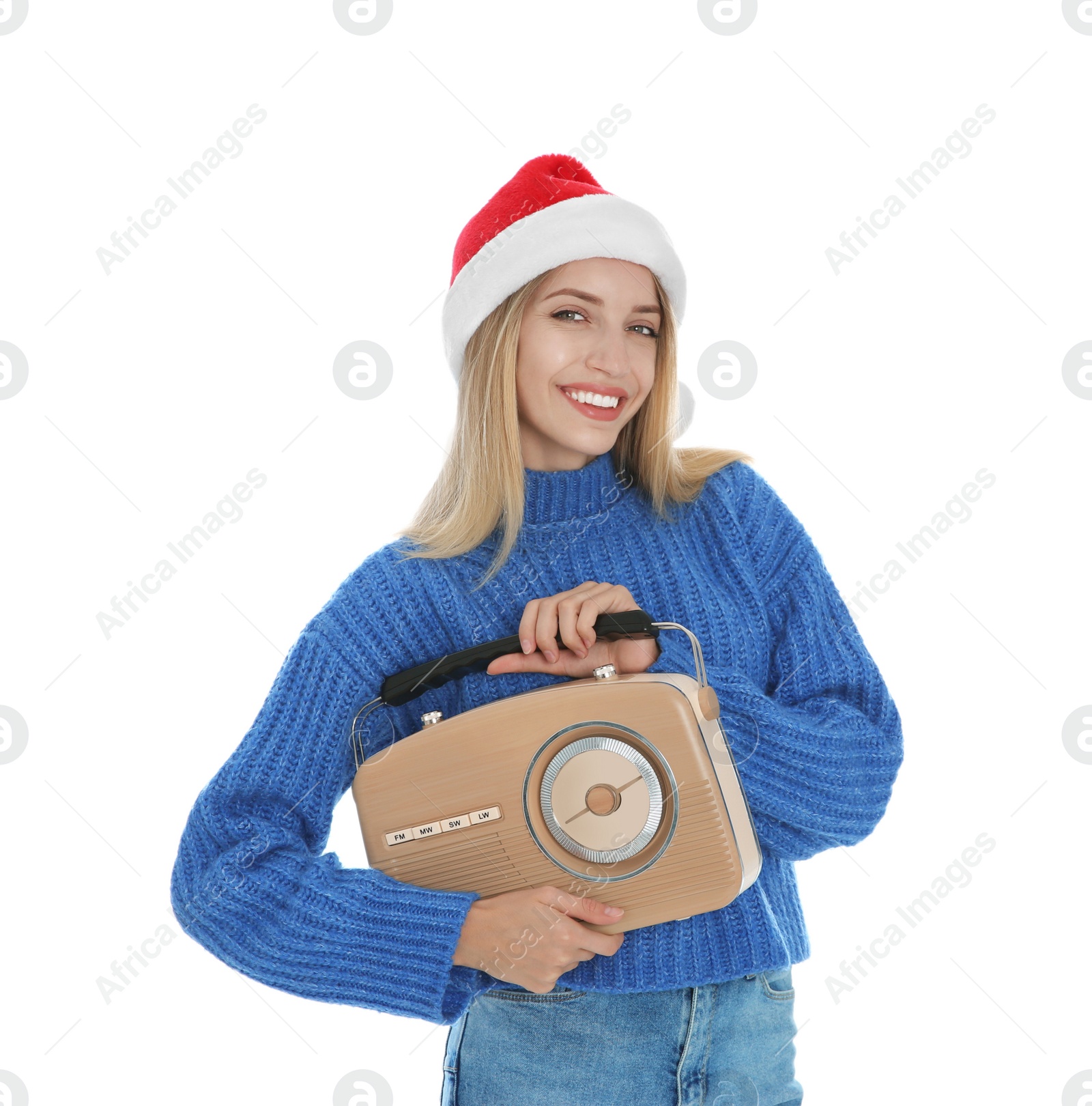 Photo of Happy woman with vintage radio on white background. Christmas music