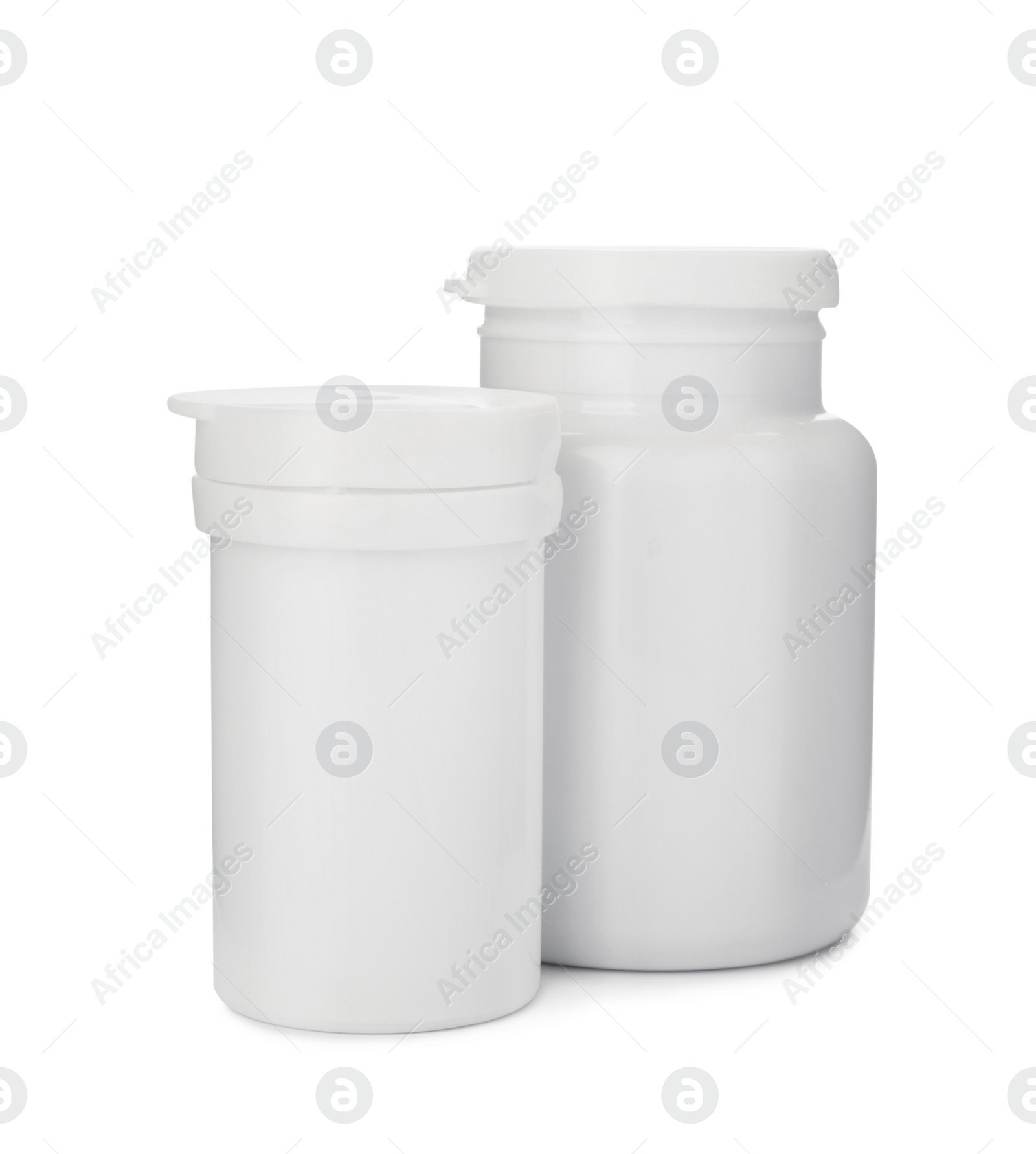 Photo of Bottles with pills isolated on white. Medicament